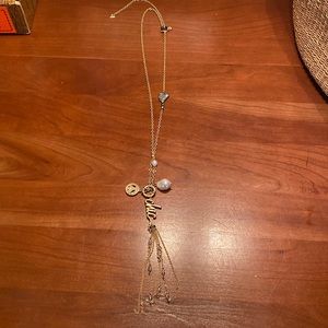 Chicho’s long necklace